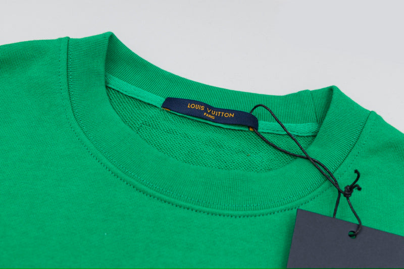 Close-up detail shot of Louis Vuitton luxury clothing with contemporary cut