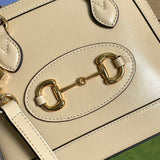 Styled lifestyle shot of structured modern women's handbag – women's designer-style accessory