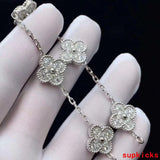 Lifestyle view of Van Cleef & Arpels unisex jewelry piece