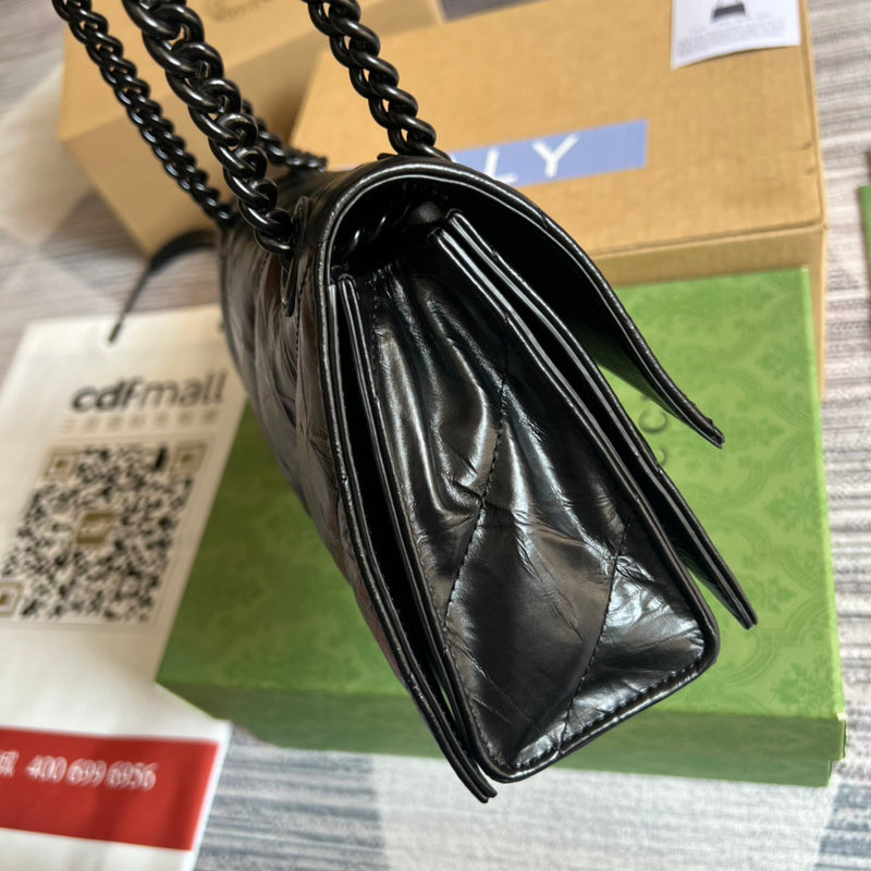 Side view of clean-lined structured handbag