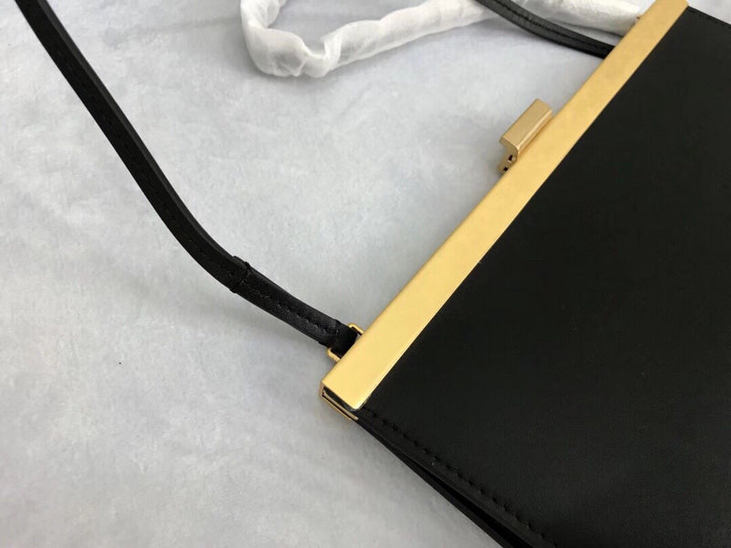 Back view of sleek chic women's handbag – women's luxury accessory