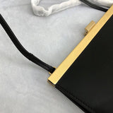 Back view of sleek chic women's handbag – women's luxury accessory