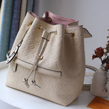 Close-up detail of structured everyday-luxe women's handbag – women's premium purse