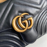Handle and strap detail of chic polished women's handbag – women's designer-style accessory