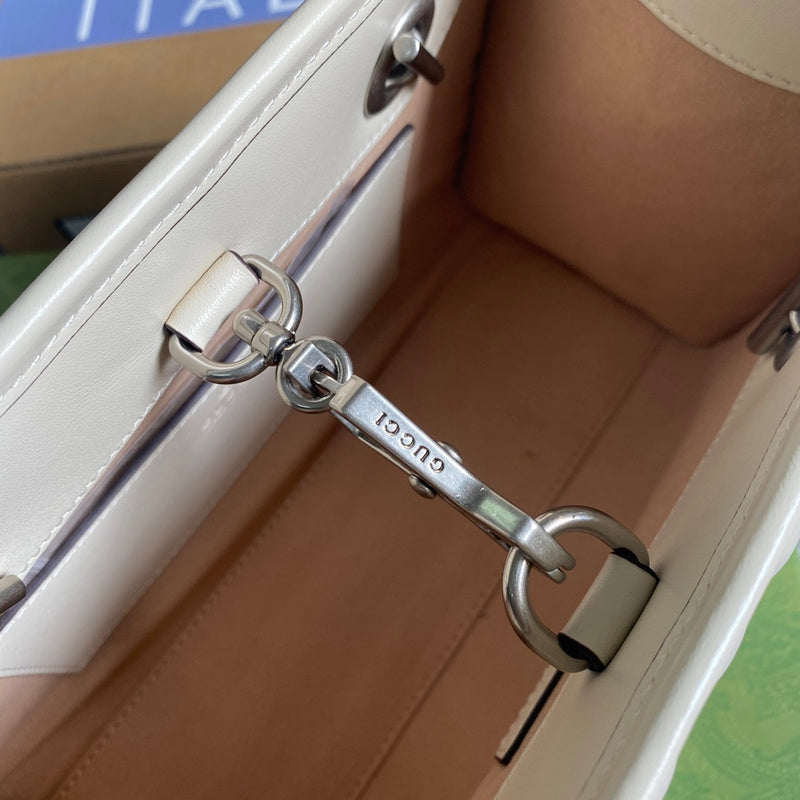 Close-up detail of modern polished women's handbag – women's luxury accessory