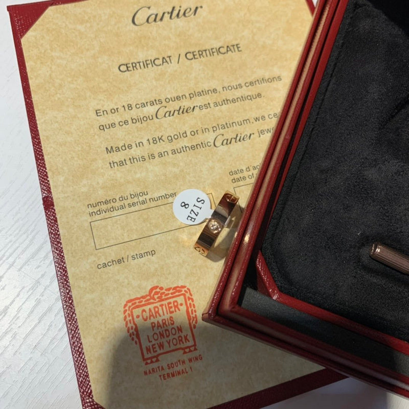 Side view of Cartier unisex jewelry piece