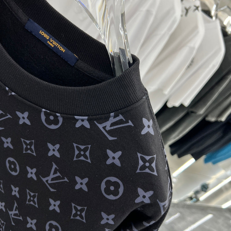 Flat lay presentation of Louis Vuitton luxury clothing with tailored silhouette