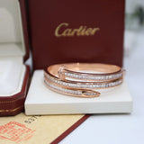 Close-up detail view of Cartier unisex jewelry piece