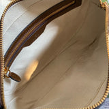 Side profile of statement premium women's handbag – women's luxury accessory