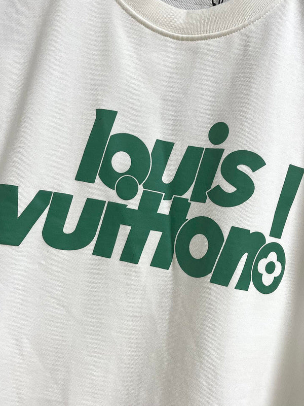 Flat lay presentation of Louis Vuitton luxury clothing with tailored silhouette