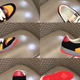 Side profile of Gucci crisp white sneakers retro runner design