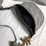 Close-up detail of statement signature women's handbag – women's premium purse