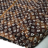Full styled look of Louis Vuitton luxury clothing with tailored silhouette