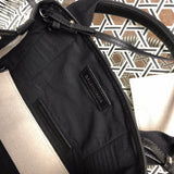 Side profile of structured everyday-luxe women's handbag – women's everyday handbag