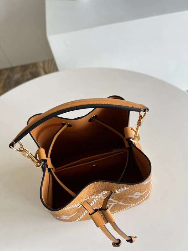 Side profile of structured polished women's handbag – women's everyday handbag