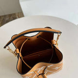 Side profile of structured polished women's handbag – women's everyday handbag