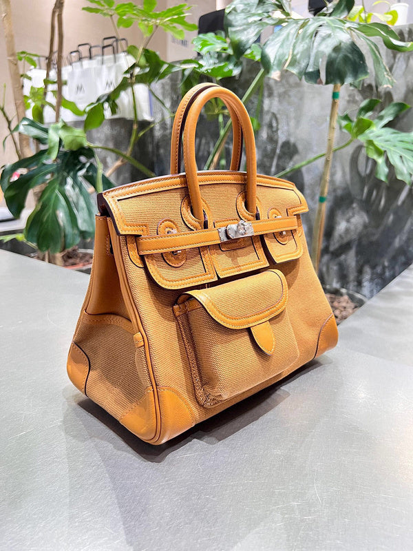 Side view of classic structured handbag