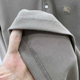 Close-up of Burberry designer clothing craftsmanship