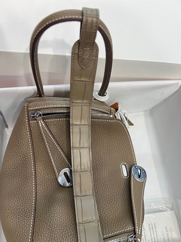 Side view of effortless structured handbag