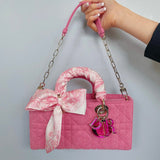 Top view of refined elevated women's handbag – women's designer-style accessory