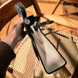 Side view of timeless structured handbag