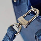 Handle and strap detail of refined structured women's handbag – women's statement bag
