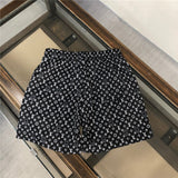 Close-up detail shot of Louis Vuitton cotton t-shirt with runway-inspired design