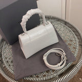 Handle and strap detail of elevated signature women's handbag – women's designer-style accessory