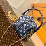 Close-up detail of signature structured women's handbag – women's statement bag