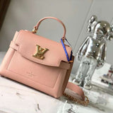 Front view of signature chic women's handbag – women's statement bag