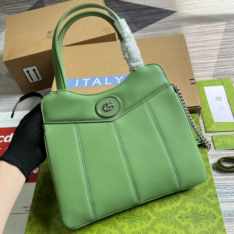 Handle and strap detail of refined classic women's handbag – women's everyday handbag