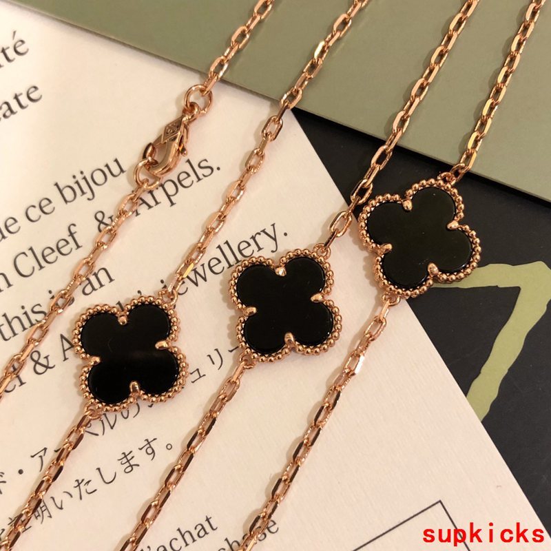 Lifestyle view of Van Cleef & Arpels unisex jewelry piece