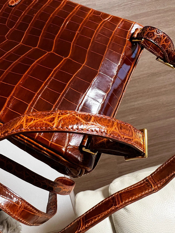 Side view of sculpted structured handbag