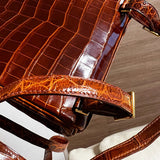 Side view of sculpted structured handbag