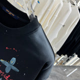 Flat lay presentation of Louis Vuitton luxury clothing with tailored silhouette