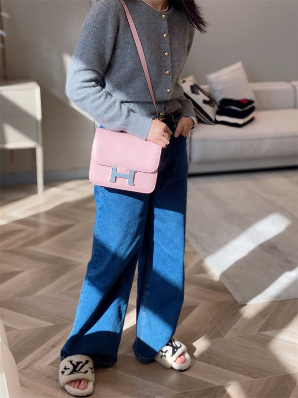 Side view of streamlined structured handbag