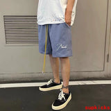 Full styled look of Rhude luxury clothing with logo-detail design