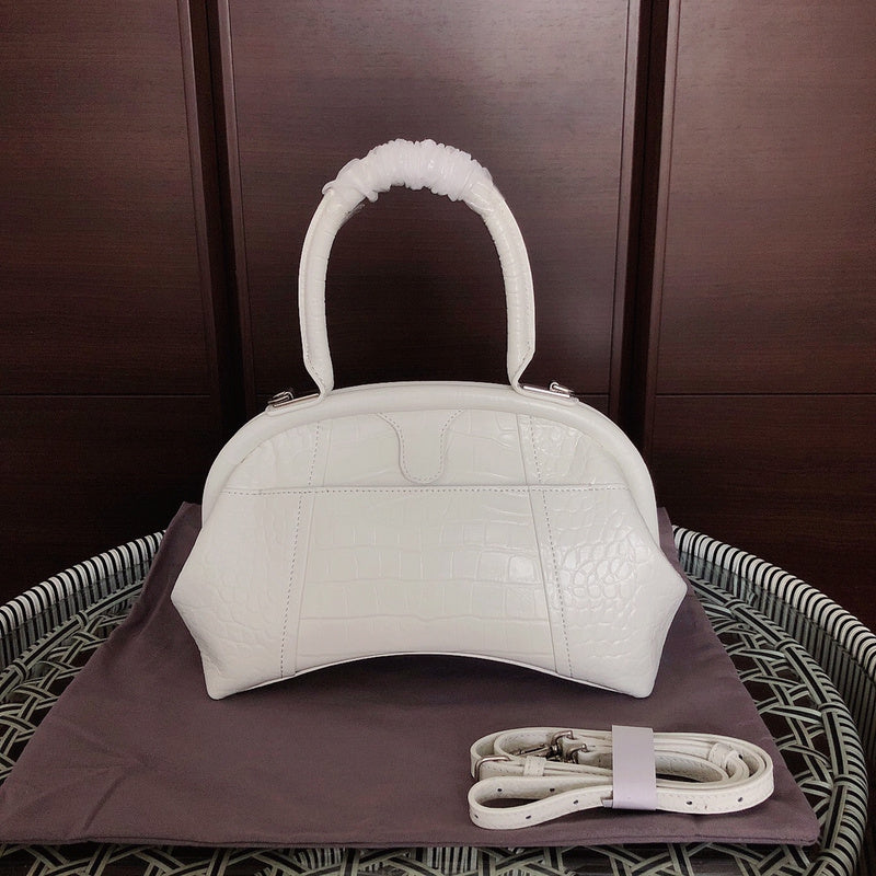 Back view of elevated modern women's handbag – women's statement bag