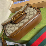 Side profile of structured statement women's handbag – women's luxury accessory