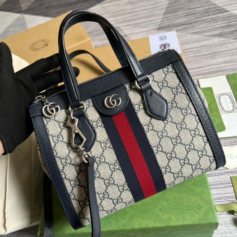 Front view of sleek refined women's handbag – women's luxury accessory