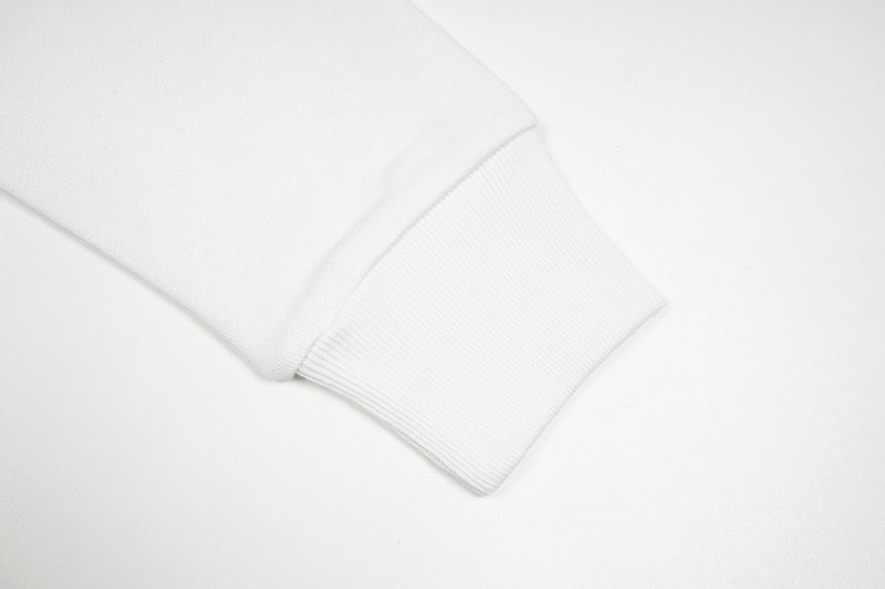 Close-up detail shot of Louis Vuitton luxury clothing with logo-detail design