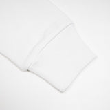 Close-up detail shot of Louis Vuitton luxury clothing with logo-detail design