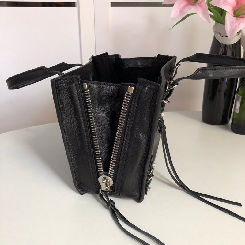 Styled lifestyle shot of polished premium women's handbag – women's everyday handbag