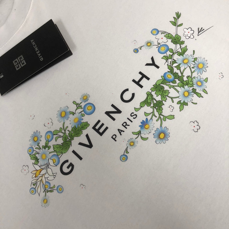 Flat lay presentation of Givenchy luxury clothing with tailored silhouette