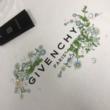 Flat lay presentation of Givenchy luxury clothing with tailored silhouette