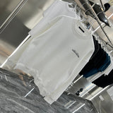 Close-up detail shot of Louis Vuitton luxury clothing with relaxed-fit cut