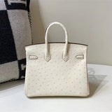 Side view of clean-lined structured handbag