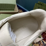 Side profile of Gucci tonal black sneakers chunky sole construction