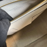Side profile of refined statement women's handbag – women's premium purse