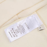 Close-up detail shot of Gucci luxury clothing with streetwear-inspired cut